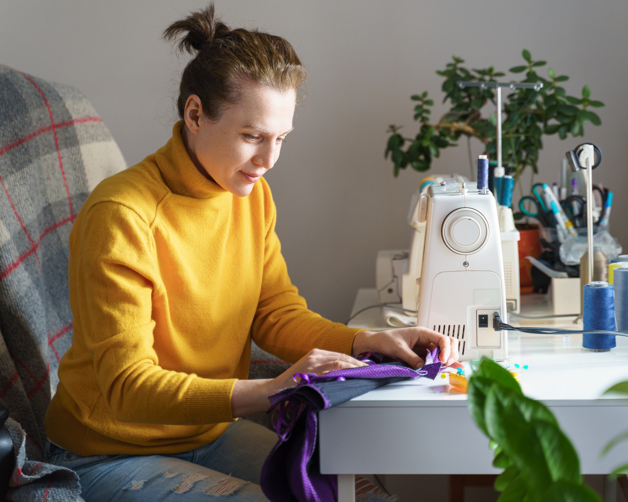 Student working on satin stitch
